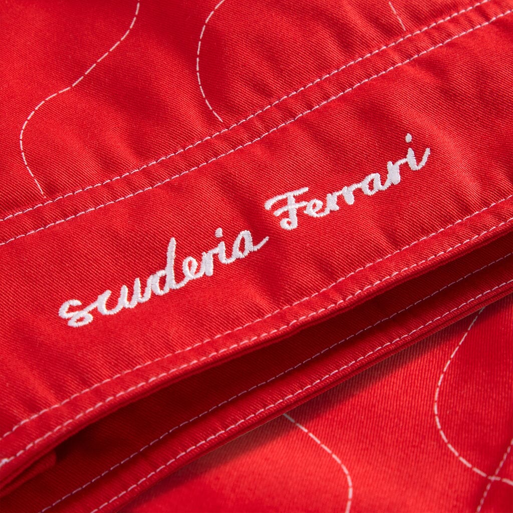 Scuderia Ferrari logo stitched on red jacket cuff