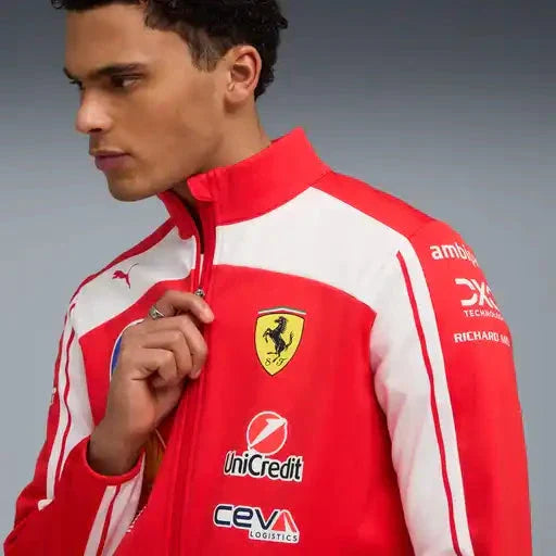 Red softshell jacket chest close-up with white shoulder panels, Ferrari and Unicredit logos